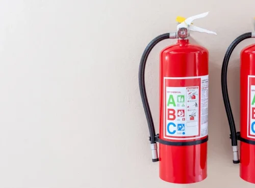 Fire extinguisher system on the wall background, powerful emergency equipment for industrial